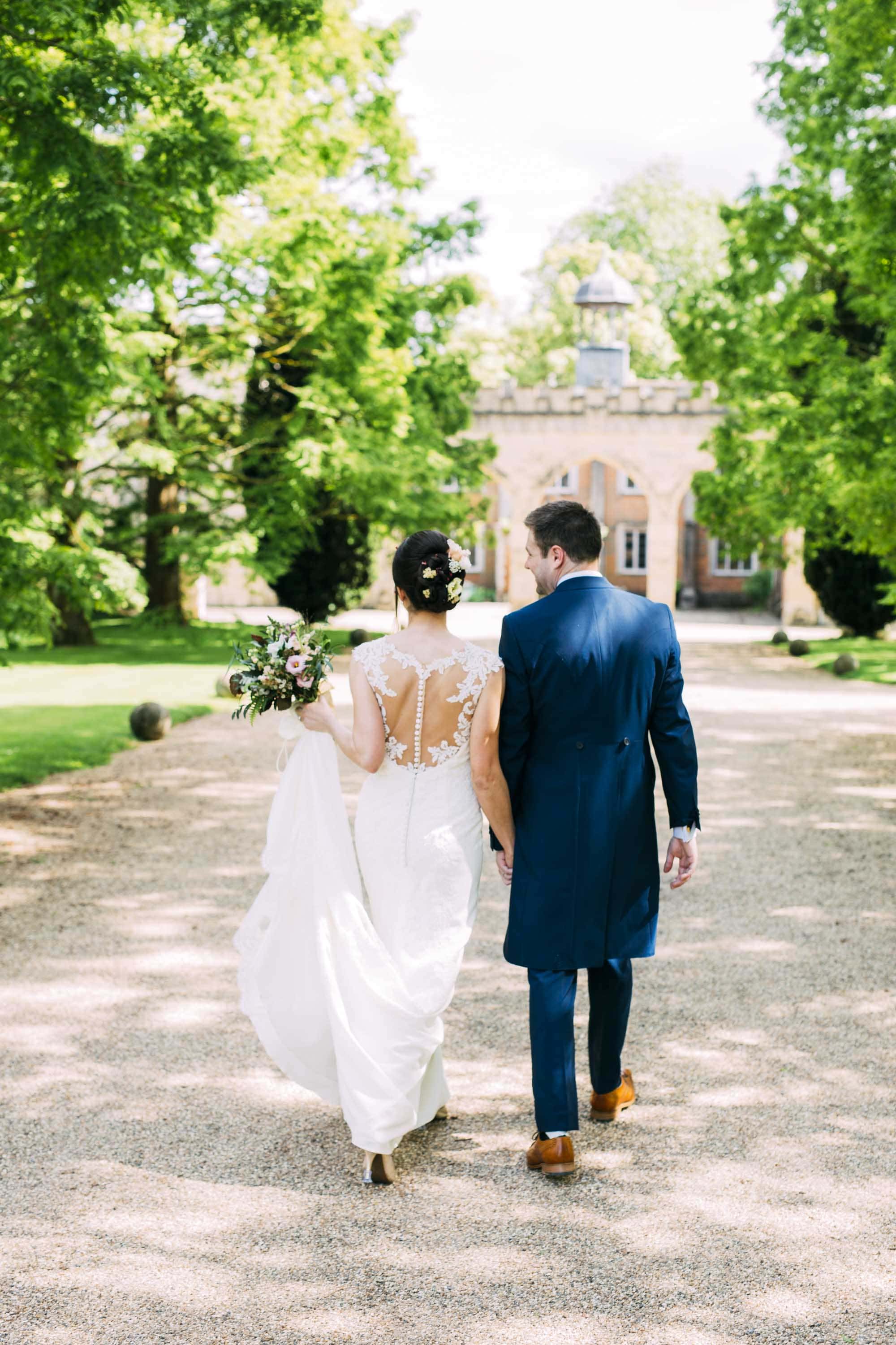 walking down driveway at nether winchendon house wedding