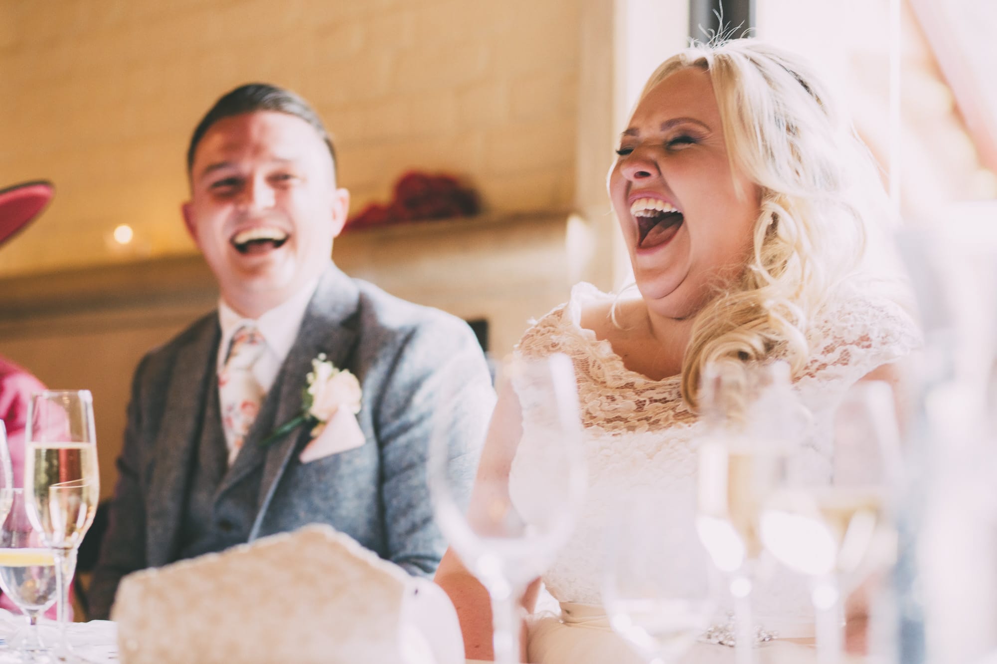 bride and groom laughing wedding speech