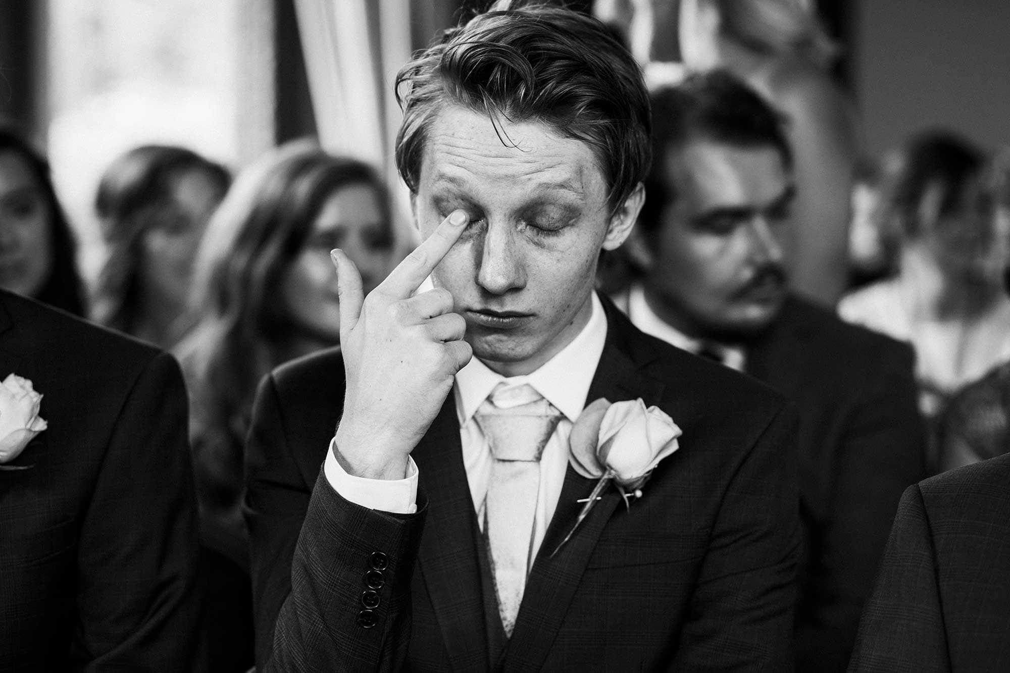 brother of bride crying