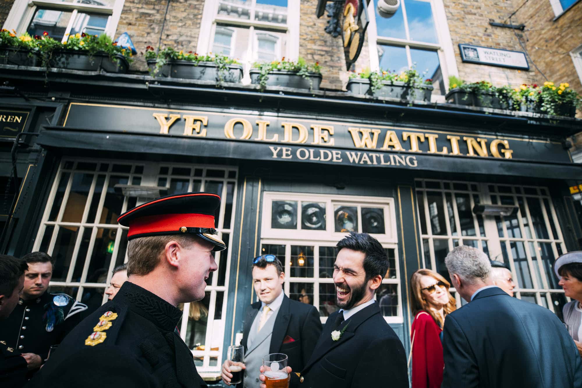 guests laughing outside ye old watling pub