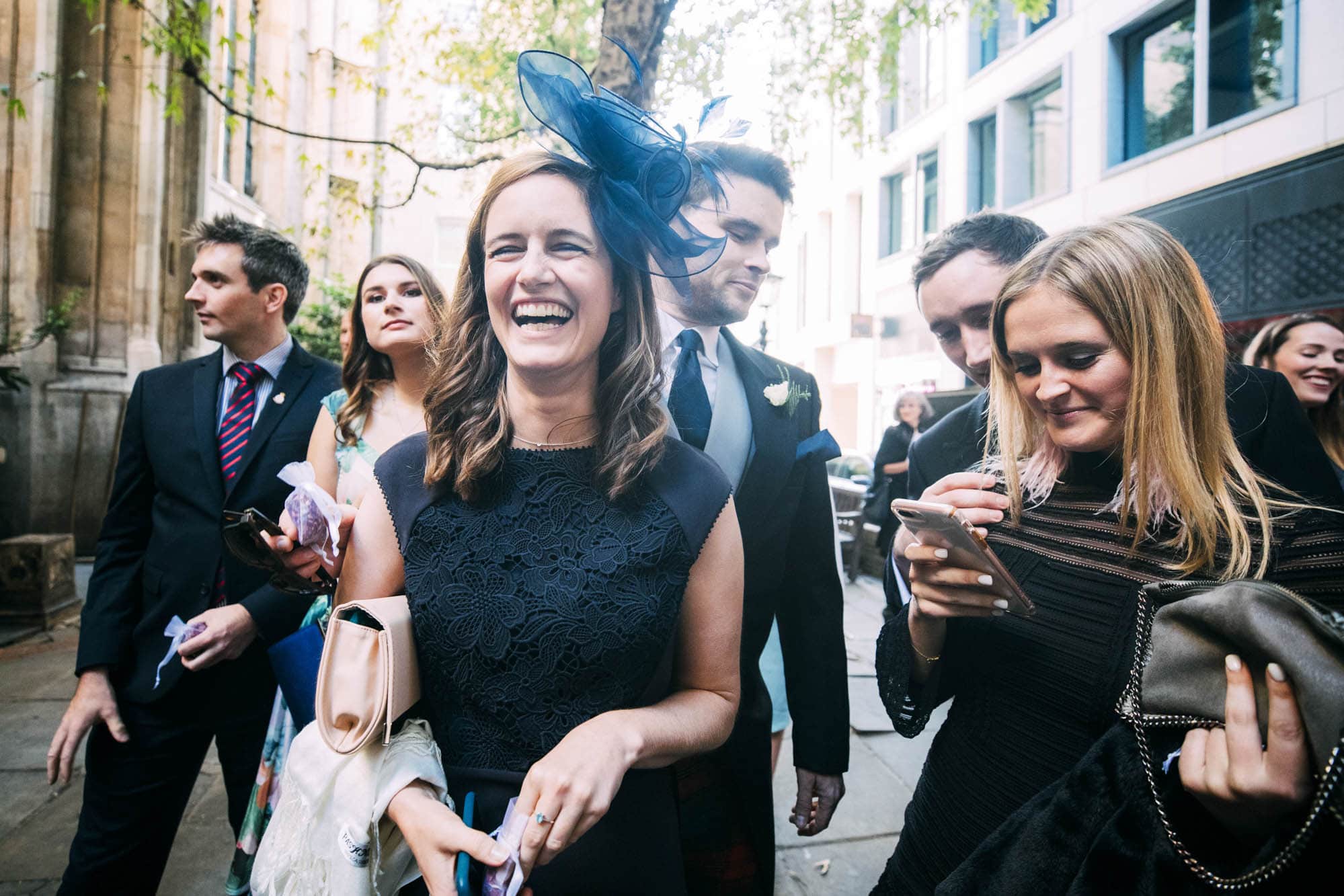 wedding guests laughing