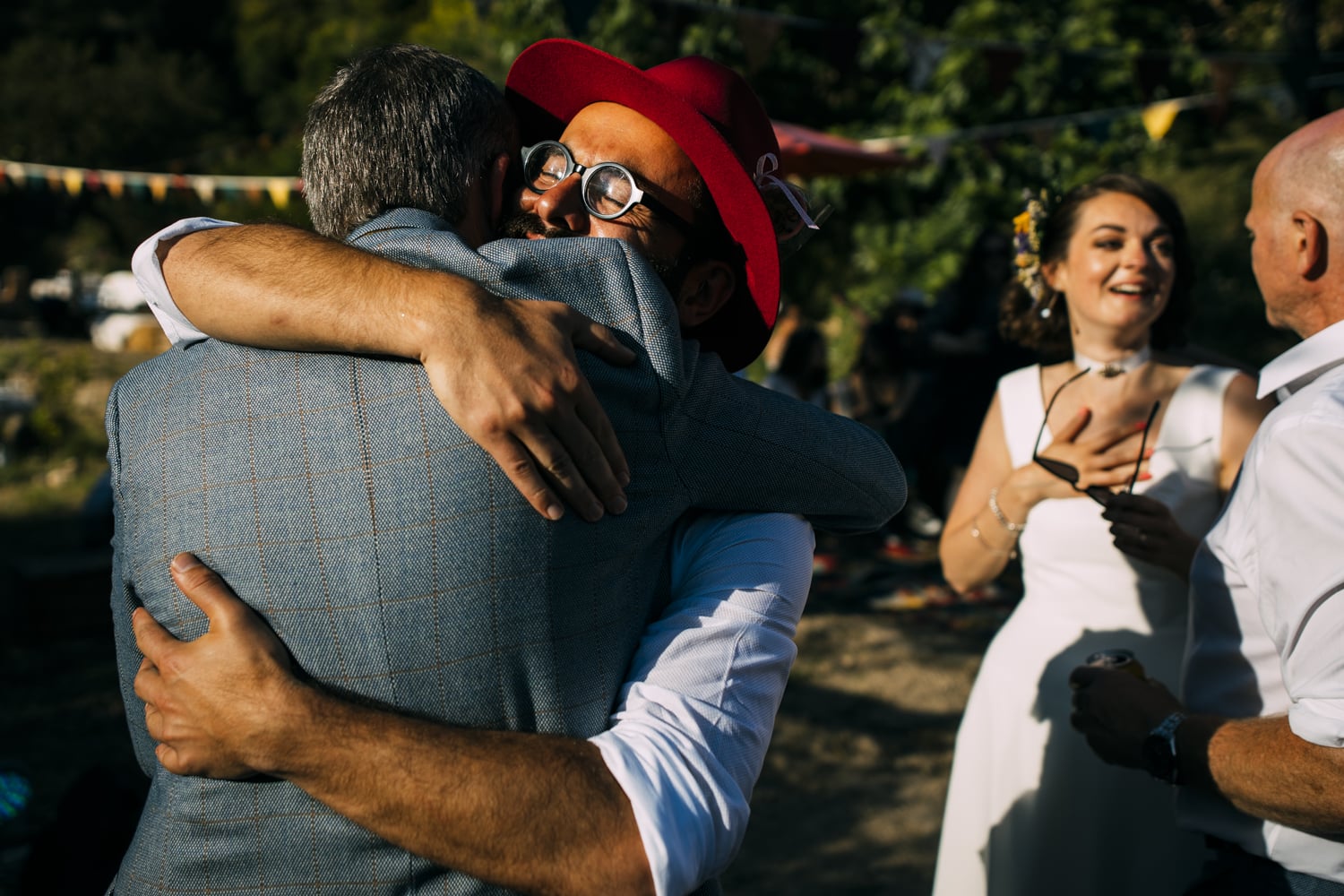 groom hugs father in law