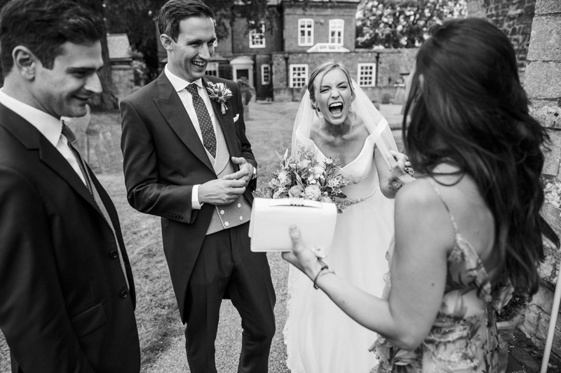 reportage wedding photographer bride laughing