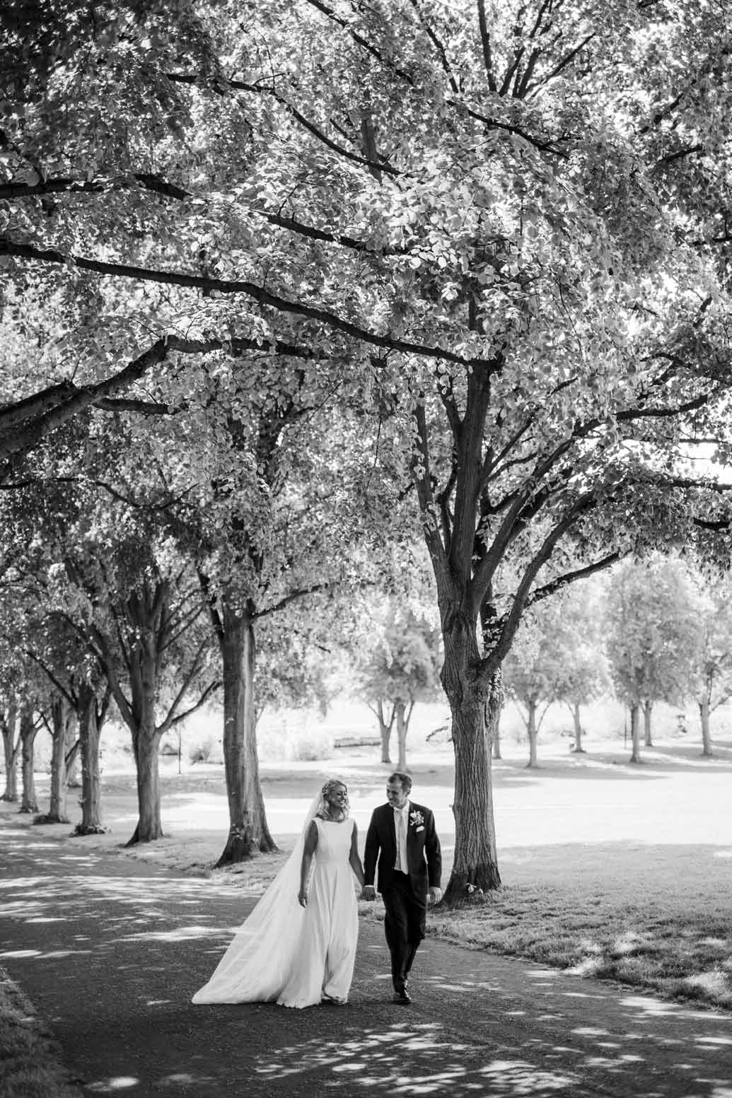 reportage wedding photography of couple walking